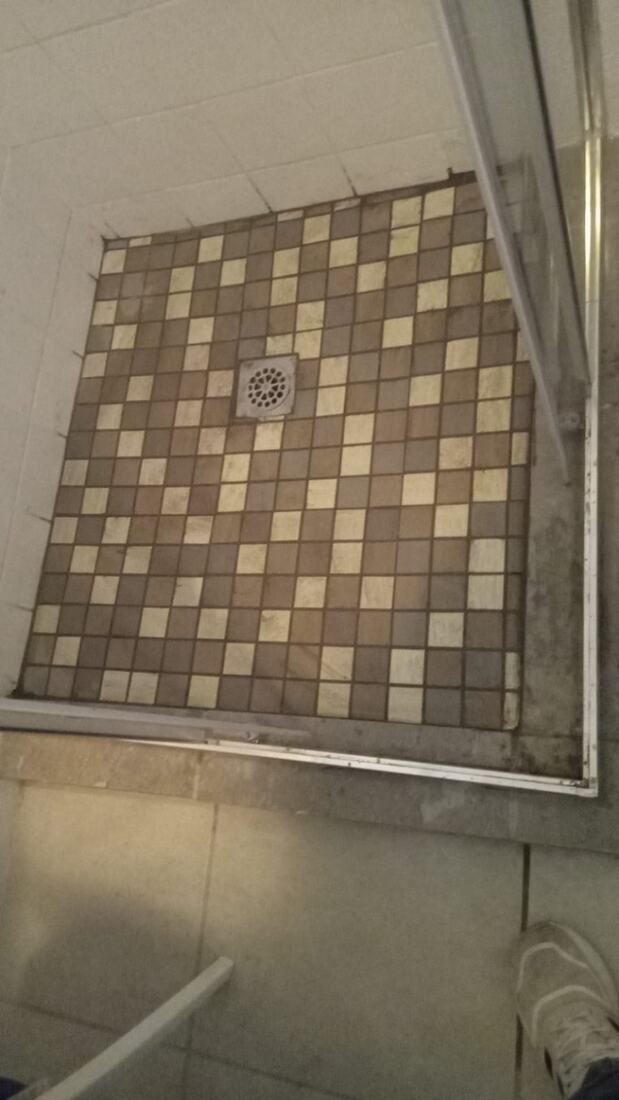Mosaic shower floor tiling